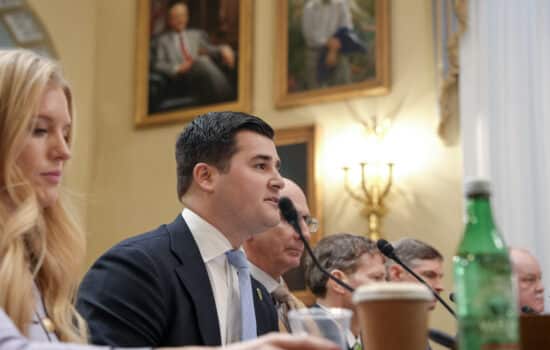 Close up of lawmakers debating