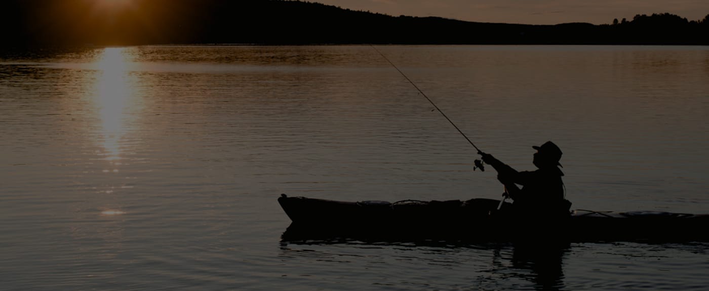 Sunset Photo of Fisherman on Lake